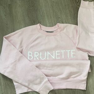 Baby pink original Brunette the Label crew neck sweater. Size M/L
